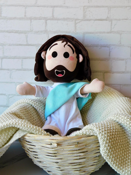 b) Peluche de Jesús