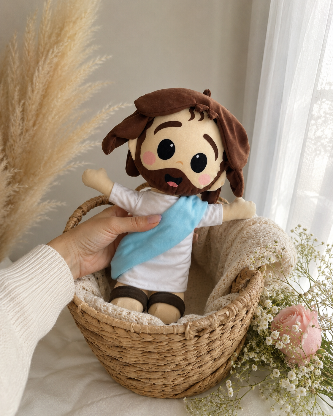 a) Peluche de Jesús