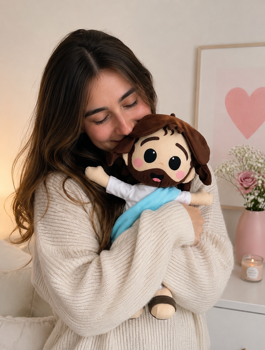 a) Peluche de Jesús