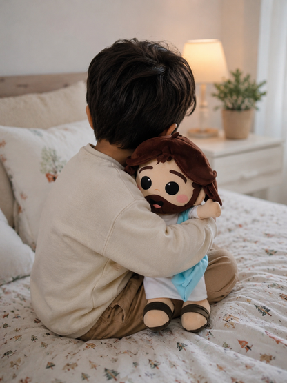 a) Peluche de Jesús