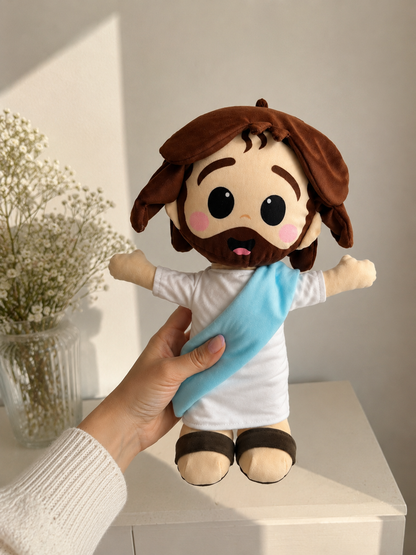 a) Peluche de Jesús