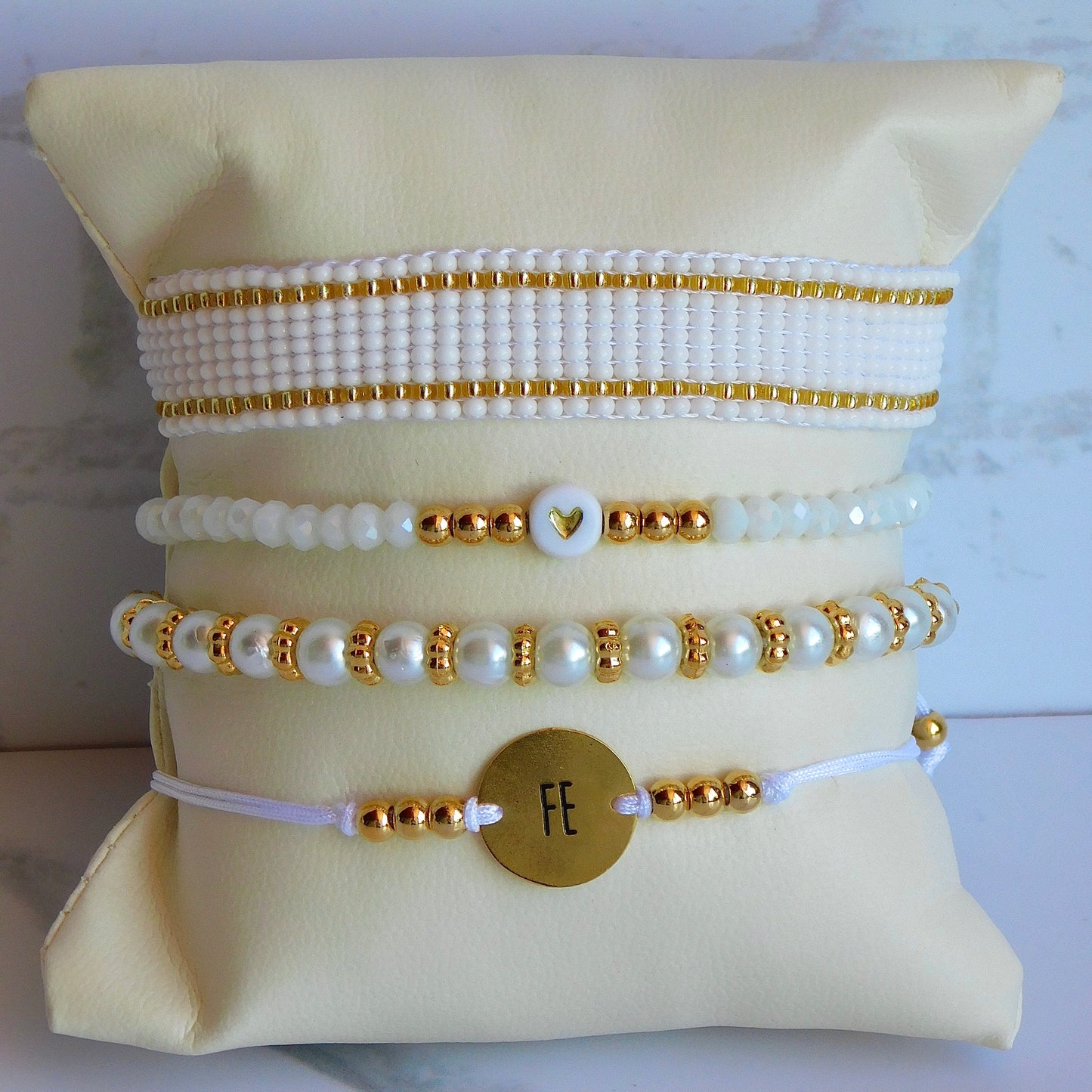 Set de pulseras Blancas