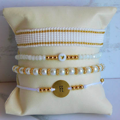 Set de pulseras Blancas