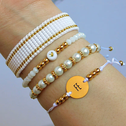 Set de pulseras Blancas